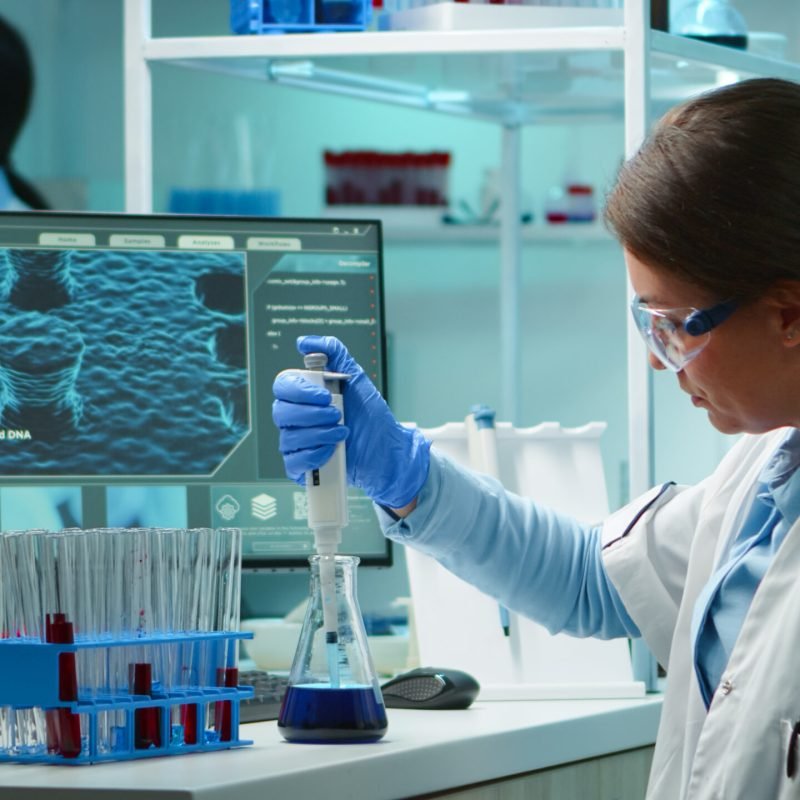 Scientist woman pipetting liquid to test tube late at night in modern equipped lab. Team examining virus evolution using high tech for scientific analysis of treatment development against covid19 SSUCv3H4sIAAAAAAAACoxVy47UMBC8I/EPK5+J8DsOX8BlTxwRB8d2ZqzNxKPEWUBo/53Oa8YOgeGymnSXy93V7dpf7989PaFaD96gT0+/pi/49m07DrHX0YcOwvjDGu9dZ12fRl57JnEacNbH0HvdpsFaR3Pu9MVBsBvbdgq/zUk0RB3HwQ3J7Rdv+jDEYF6uUAYkyMZje6cvQ/QzES1v9P60wM8hBsiwLWFCG8a+Dj9SEm1D7WZ8RmJ0l5HcMxcoZo5mtQznMUbX/0l0DZ0VWcS6axj8nSOlniR2rbu4Lg5p6YSyvsl5p+N27KbeWaKg0dGdQPJMw22iX5fvpy2xthohhb4Y7zrj0HrB0tVYT6lnPxjXtrpzASaw5ZcL/8L22ek2no3u3cdnWAIDG/D/xMuPb7cRnaCwn1M7b0mjPeikl1VZ20Ki4bUk3BZGNKLgolaFVvDHaYuZNFVlBN/KQJbhUmNXFtjZpuA1pYVSlBW0NNYpYbCk8gamWGlJtCwIobLgXJaFwiUvcM0sMUoQXd3BpGwkt8oVxDooA7MaypBNoQwmFQduLe3c7NIhevkOm3OZ57X2pkfrQzK/1wACzguRCHDtvfHdKTkW4nl+j9sxE8Yu9pNy6FZcG8JV1+20Ng1wui1+1sMAcLvF05WC1x8uyT1diLPuKyuysHPTJ2FUCKoYVZWgpKxUhdJnffbAM5ezFThe26Ctmy697dDBg5e4KgUmbFv+/dufAIqxCvM7YO8CR5jMEA7ymTccEuxc4giT+8UBYGcdR5DNRI5yezs5rmFnLAuI45ufJB6z5giXS2p759OjvXgoNR9XakTzUV5yxv4pYn7vwSinyx+NMsccq5BjchXz3K55KtWDAXGm1INFmJ/CgyFUgOF4FTr7Rwhs3qYmngmJwFawwKrEd0NLdQTHklxxydktv5cRKIjiGFcJhctVRJxVivJS3W1zExGBfJiKsrpfsGkIlehTGAwgoSRKMMEYK3rD7fREREEbQlJ2t9C9nkgpwQQhq6EcqYlATmDhZLbWVUY/7SoyrNbONaSoOcMFZ6aGX0oVjaaGOlma2k2n3n4DAAD//wMA5XymIv8IAAA=